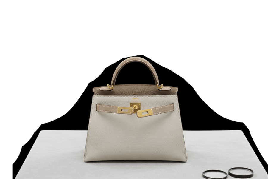 Kristal Luxury, consignment handbag process one, appraiser authenticating a Hermes Kelly handbag