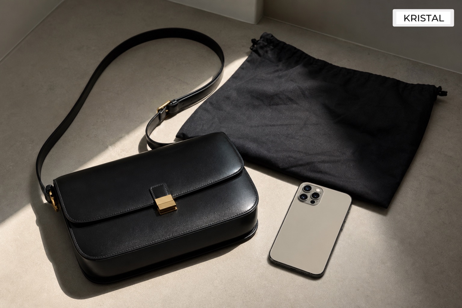 Minimalist luxury shoulder bag beside phone and dust bag for a Malaysia seller enquiry