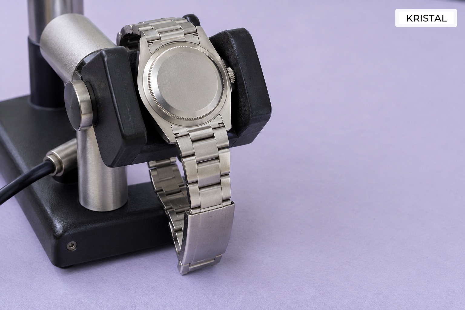 A closed watch positioned for professional assessment; the image shows no test result.